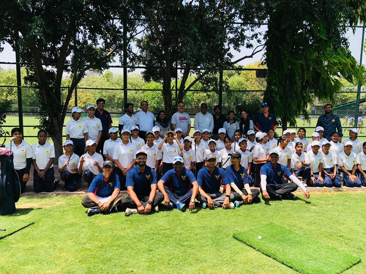 Happy kids playing golf